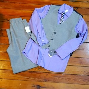 Brand New 4 piece Van Heusen suit size 12